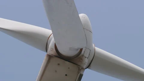Rotating 3 blade horizontal-axis wind turbine HAWT, close up 3. 4K locked tripod Stock Footage 149642167