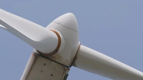 Rotating 3 blade horizontal-axis wind turbine HAWT, close up 4. 4K locked tripod Stock Footage 149643849