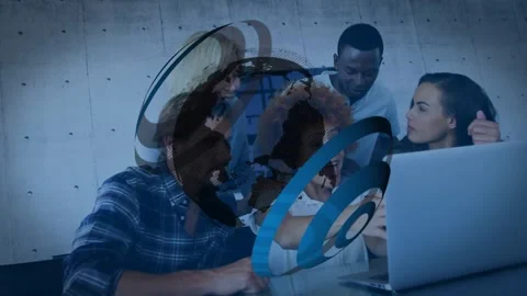 Rotating 3D globe logo animation fading and revealing coworkers reviewing Stock Footage 319783008