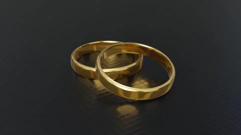 Rotating 3D Gold Rings on the Floor Stock Footage 284026484