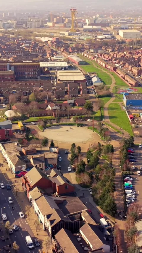 Rotating 60FPS vertical social ratio aerial video of C.S. Lewis Square in East Stock Footage 332760874