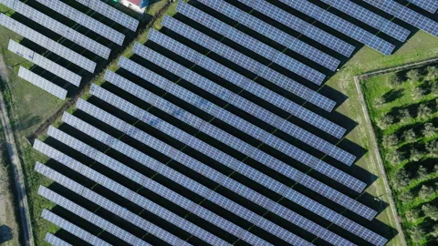 Rotating Aerial View of Solar Panel Array Stock Footage 302883619