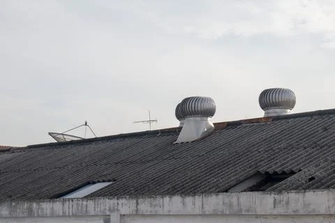 Rotating air ventilation system on the rooftop. 写真素材