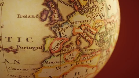 Rotating ancient globe on a red background loop Stock Footage 120252671