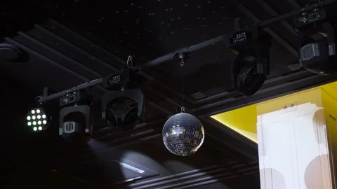 Rotating and sparkling disco ball on the ceiling Stock Footage 219225612