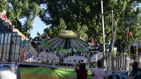 Rotating and Tilting Carousel at the Nevada State Fair - Shallow DOF Stock Footage 155282944