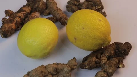 Rotating and Top View of Lemon and Ginger Stock Footage 267724066