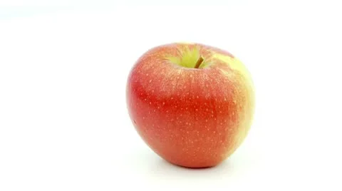 Rotating apple on white background Stock Footage 8979460
