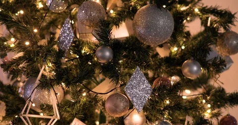Rotating around Christmas tree decorated with golden balls and garlands. Stock Footage 120160204