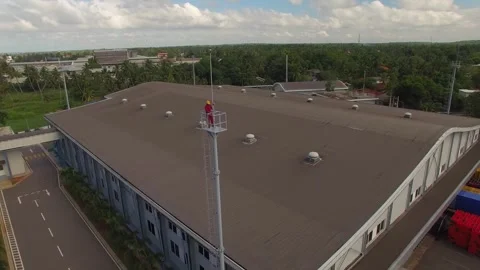 Rotating around the man on the tower 2 Video stock 288234822