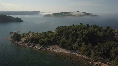 Rotating around multiple rock islands Stock Footage 100128943