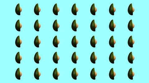 Rotating avocado pattern on cyan background Stock Footage 156813276