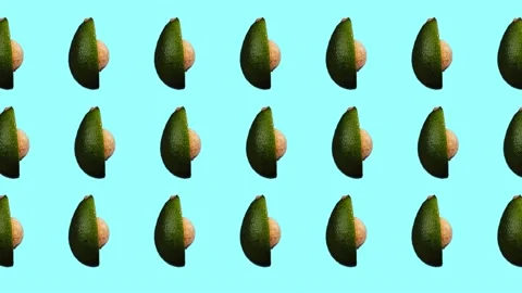 Rotating avocado pattern on cyan background Stock Footage 156813301