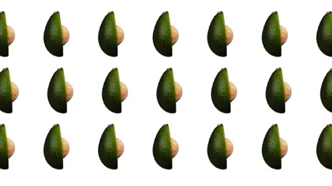 Rotating avocado pattern on white background Stock Footage 156813360