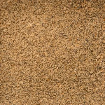 Rotating Backdrop of Crashed Wood Fuel Pellets or Pet Litter. Natural Wooden Cat Stock Photos