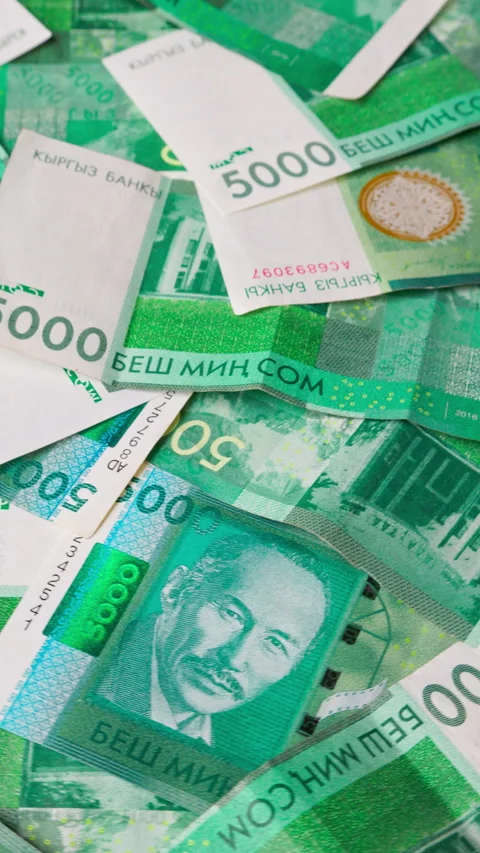 Rotating background of 5000 Kyrgyzstani Som banknotes Stock Footage 305084501
