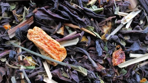 Rotating background from black tea blend with natural additives. Stock Footage 232728296