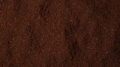 Rotating background of ground roasted coffee 스톡 동영상 346738181