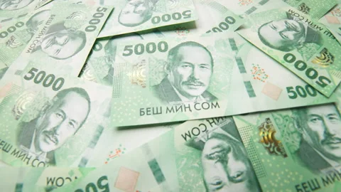 Rotating background of new 5000 Kyrgyzstani Som banknotes Stock Footage 314604445