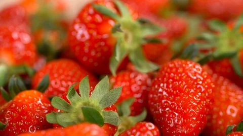 Rotating background of strawberry Stockbeeldmateriaal 74601909