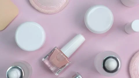 Rotating background from various bottles and jars with lotion for creams and Stock Footage 245903225