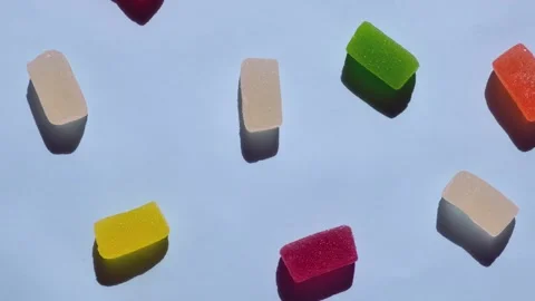 Rotating background of various jelly sweets, candies,close-up top view concept Stock Footage 245604873