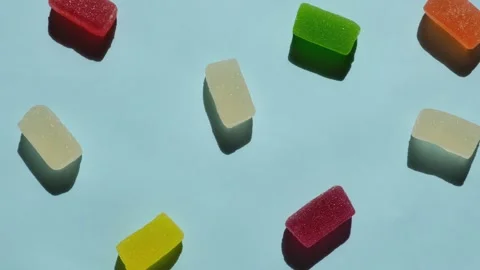 Rotating background of various jelly sweets, candies,close-up top view concept Stock Footage 246660168