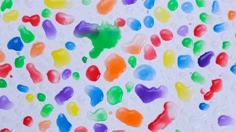 Rotating background white background with colorful drops of paint ,top view Stock Footage 201853515