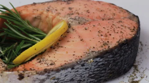 Rotating baked salmon steak Stock Footage 64830461