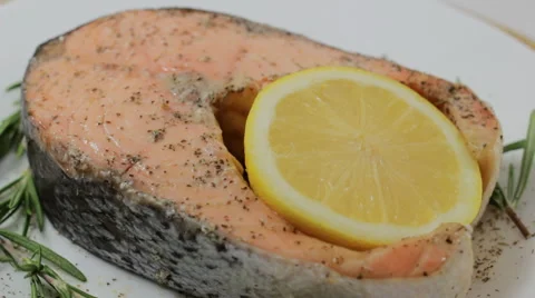 Rotating baked salmon steak Video stock 64831414