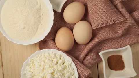 Rotating baking ingredients for a homemade cake Stock Footage 344604381