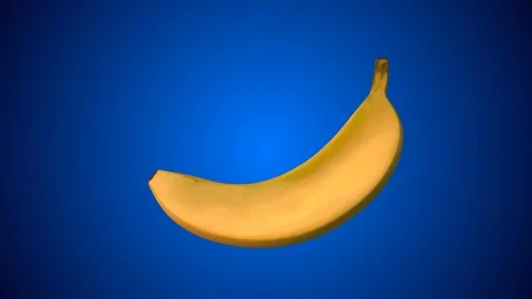 Rotating banana on blue background Video stock 85579900