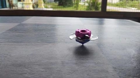 Rotating beyblade Stock Footage 218340812