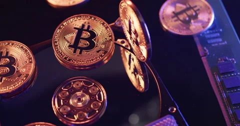 Rotating Bitcoin and Hard Drive. Storage of massive Blockchain Data on Server Stock Footage 172053397