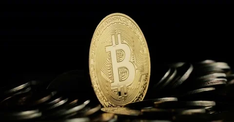 Rotating Bitcoin on a black background Stock-Footage 79036461