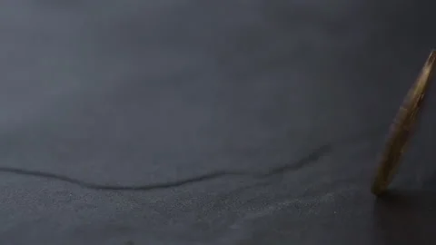 Rotating Bitcoin on black table, Stock Footage 174594074