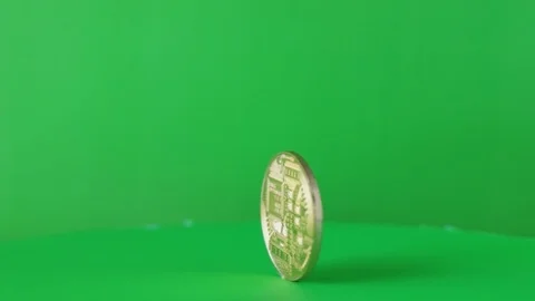 Rotating Bitcoin on a green background, 스톡 동영상 87328825
