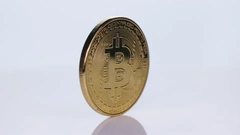 Rotating Bitcoin on a white background. Bitcoin Cryptocurrency Digital Bit Coin Stock Footage 194641699