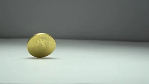 Rotating Bitcoin on a white background Stock Footage 87268535