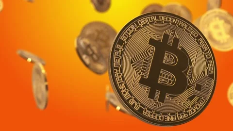 Rotating Bitcoins on Orange Backdrop Stock Footage 161643348