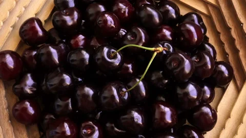 Rotating Black Ripe Sweet Cherry. Stock-Footage 90844596