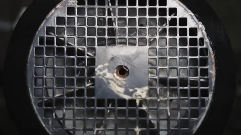 Rotating blades in the vent pipe. at the factory Stock Footage 105606954