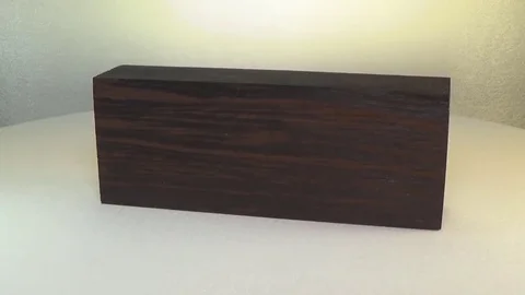 Rotating the block of wood wenge. Stock Footage 78713739