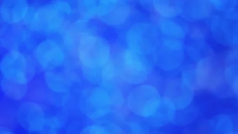Rotating blue abstract bokeh bubbles background Stock Footage 225195875
