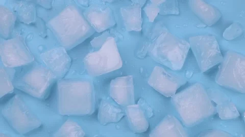 Rotating blue background with ice cubes and water drops Stock Footage 196009474