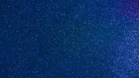 Rotating blue background. Two intersecting beams of light Видео 239243020