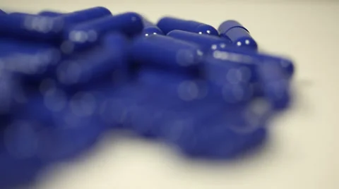 Rotating Blue Capsules Close Up 1 Video stock 34265961