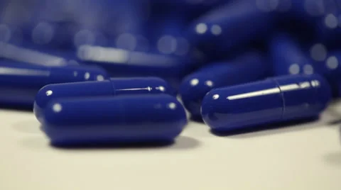 Rotating Blue Capsules Close Up 2 Video stock 34265965