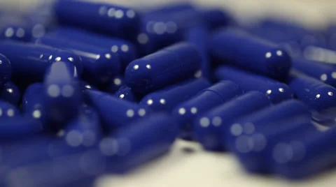 Rotating Blue Capsules Close Up 3 Video stock 34265959