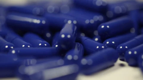 Rotating Blue Capsules Close Up 4 Video stock 34265953